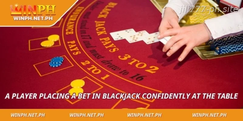 A player placing a bet in blackjack confidently at the table